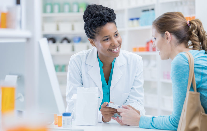 Pharmacist Consulting a Patient