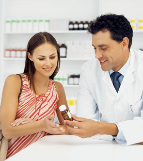 Pharmacist Talking to Patient